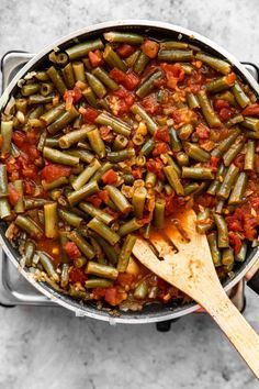 Easy Lebanese green beans, also known as fasolia. Vegan, healthy, and so delicious made with just a handful of ingredients. You'll love this! #lebaneserecipes #lebanese #veganrecipes #greenbeans Lebanese Green Beans, Leftover Green Beans, Green Bean Dishes, Beans And Tomatoes, Green Beans And Tomatoes, Vegan Healthy, Eastern Cuisine, Green Bean Recipes, Lebanese Recipes