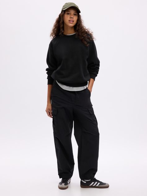 Soft cotton-blend sweatshirt.  Crewneck.  Long raglan sleeves with banded cuffs.  Certain styles have an embroidered Gap arch logo at chest.  Banded hem.  Straight silhouette with a relaxed fit.  Hits at the hip.  Models wearing Gap Black Sweatshirt Outfit, Black Crewneck Sweatshirt, Arch Logo, Raglan Sweatshirt, Winter Lookbook, Bad Habit, Black Crewneck, Sweatshirt Outfit, Vintage Soft