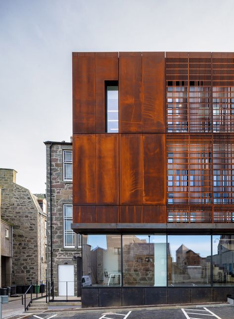 Perforated Corten Steel Facade, Rusted Steel Architecture, Corten Steel Screen, Corten Steel Panels, Corten Steel Building, Brick And Steel Architecture, Corten Steel Texture, Perforated Corten Steel, Corten Cladding