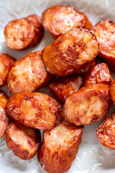 This Air Fryer Kielbasa recipe makes the most deliciously crispy yet tender smoked sausage! In just a few minutes, you'll have perfectly cooked sausage that you can serve as an appetizer, with side dishes, or use in a recipe. Air Fryer Kielbasa Recipes, Sides For Kielbasa, Quick Kielbasa Recipes, Kielbasa Appetizer Recipes, Kiebalsa Sausage Recipe, Kielbasa In Air Fryer, Air Fryer Smoked Sausage, Air Fryer Kielbasa, Turkey Kielbasa Recipes