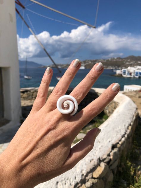 Natural spiral seashell ring , rare find summer must have 🧿 #fashion #mykonos #rings #natural #boho #seashell #ooak #giftforher #summer #jewelry #style #greekislands #mykonosgreece #fashion # mykonosbyboni Seashell Ring, Spiral Ring, Mykonos Greece, Shell Ring, Diy Rings, Skull Jewelry, Greek Islands, Mykonos, Sea Shells