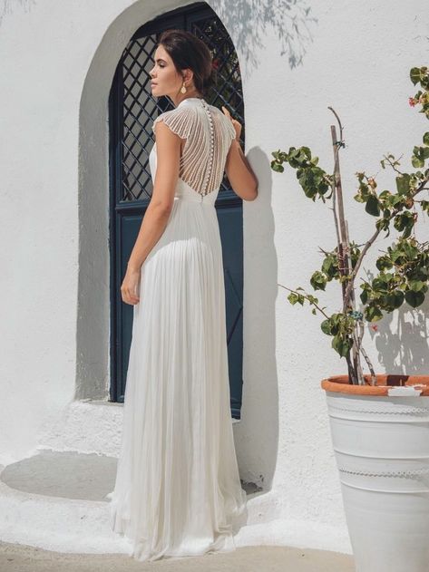 This stunning Catherine Deane wedding dress features a pearl beaded statement back and sleeves! Catherine Deane Wedding Dress, Catherine Deane Bridal, Wedding Dress Crafts, Column Wedding Dress, Catherine Deane, Pearl Wedding Dress, Wedding Dresses Hippie, Wedding Dress Bustle, Wedding Dress Cap Sleeves