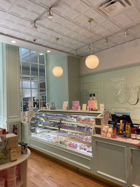 Cake Store Design Bakery Shops, Sage Green Bakery Interior, Aesthetic Cafe Design Interior, Candy Shop Design Interiors, Aesthetic Shop Interior, Bakery Kitchen Aesthetic, Candy Store Interior, Green Bakery Aesthetic, Bakery Design Interior Small Spaces