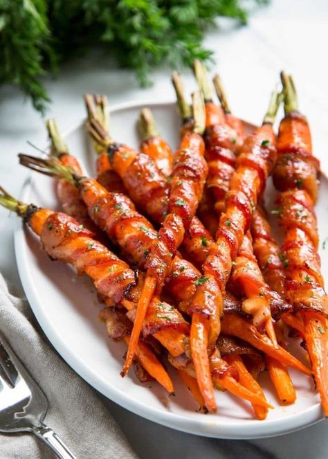 Looking for an appetizer that will really wow? Try these marinated bacon-wrapped carrots —the maple and sriracha glaze will blow your socks off! They also make a decadent side dish for the holidays. | Recipe by Kevin is Cooking #holidaydishes #warppedcarrots Bacon Wrapped Carrots, Maple Carrots, Sides Veggies, Maple Sriracha, Bacon Crisps, Best Thanksgiving Side Dishes, Carrots Recipe, Keto Pancakes, Delicious Thanksgiving