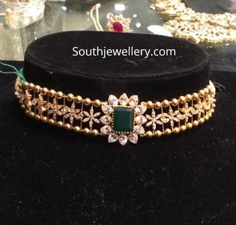 22 Carat gold simple choker studded with cz stones and emerald by Premraj Shantilal jewellers. light weight choker designs for kids Indian Choker Necklace, Simple Choker, Choker Necklace Designs, Choker Designs, Pearl Necklace Designs, Gold Necklace Indian Bridal Jewelry, Gold Pendant Jewelry, Indian Jewelry Sets, Gold Jewelry Simple