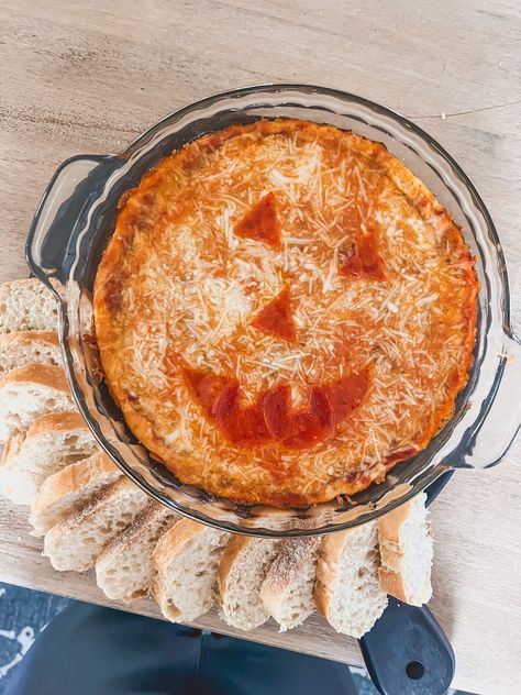 Halloween Pizza Dip, Halloween Dips Appetizers, Jack O Lantern Pizza, Jack O Lantern Spinach Dip, Halloween Bread Bowl Dip, Pepperoni Pizza Pumpkins, Halloween Dips, Fiesta Chicken Crockpot, Jack-o'-lantern Spinach Dip Bread Bowl