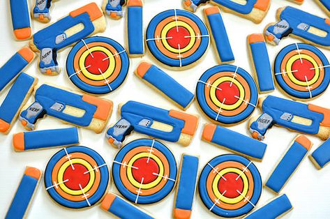 Nerf Gun Cookies by Kelley Hart Custom Cookies Nerf Cookies Decorated, Nerf Cookies, Nerf Cake Ideas, Nerf Party Ideas, Nerf Birthday Cake, Nerf Birthday Party Games Shooting Range, Boys Nerf Birthday Shirt, Nerf Cake, Paintball Party