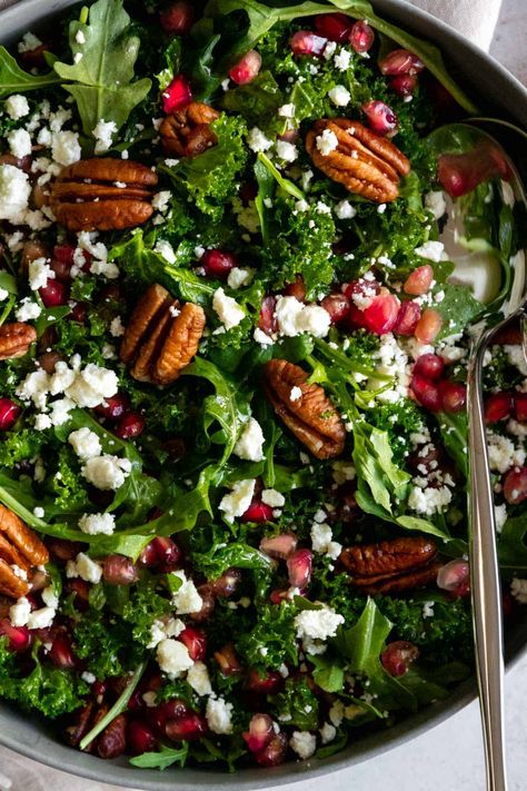 Pomegranate Kale Salad - Coco and Camellia Kale Salad Christmas, Thanksgiving Pomegranate Salad, Thanksgiving Menu Healthy, Holiday Kale Salad, Kale Salad Photography, Spinach Almond Salad, Kale Salad Pomegranate, Pomegranate Seed Salad, Kale And Pomegranate Salad