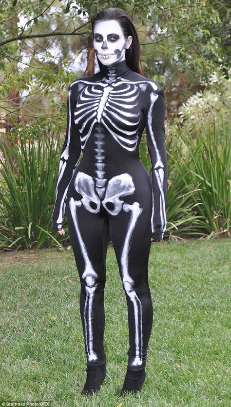 Looking good: The 34-year-old reality star showed off a toned figure in her catsuit with w... Zombie Costume Women, Kardashian Halloween, Halloween Decorations Indoor Scary, Skeleton Costume Women, Halloween Facebook Cover, Adult Halloween Party Decorations, Skeleton Halloween Costume, Den Mrtvých, Celebrity Halloween