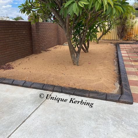 Another Black Rock style of Kerbing but this time with brown accents to tie in with the Pea Gravel behind. Unique Rock is Continuous Concrete garden edging that is hand sculpted and coloured to look like rocks that blend into the landscape they are being installed in - ONLY AVAILABLE from Unique Kerbing. Our Glaze and Hand Sculpted Finishes are available in a wide range of colours which won't fade or attract dirt & mould like plain concrete kerbing. We have been Glazing Kerbing throughout the Concrete Garden Edging, Pea Gravel, Concrete Garden, Garden Edging, Black Rock, The Landscape, Rock Style, To Look, Glaze