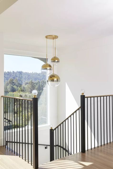 30 Stair Railing Ideas That Will Level Up Your Staircase Switch Back Staircase, Back Staircase, Modern Staircase Railing, Stair Railing Ideas, Black Stair Railing, Glass Railing Stairs, Rustic Staircase, Modern Stair Railing, Wood Handrail