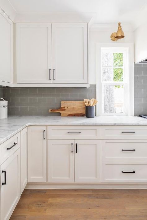 White Shaker Cabinets Subway Tile Backsplash, Dark Gray Subway Tile Backsplash, Grey Lowers And White Uppers, White Kitchen Cabinets With Grey Backsplash, White Kitchen Cabinets Grey Backsplash, White Cabinets Grey Subway Tile, Door Handles For White Kitchen Cabinets, White Cabinet Gray Backsplash, White Cabinet Grey Backsplash