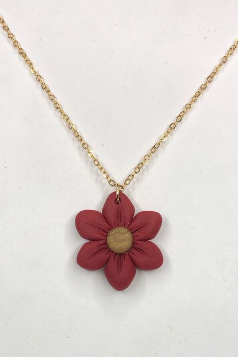 Carefully handcrafted polymer clay flower pendant strung on a delicate gold chain. DM for custom orders or for personalization Clay Flower Pendant, Clay Flower Necklace, Handmade Decorative Items, Delicate Gold Chain, Flower Handmade, Clay Flower, Necklace Flower, Polymer Clay Necklace, Polymer Clay Flowers