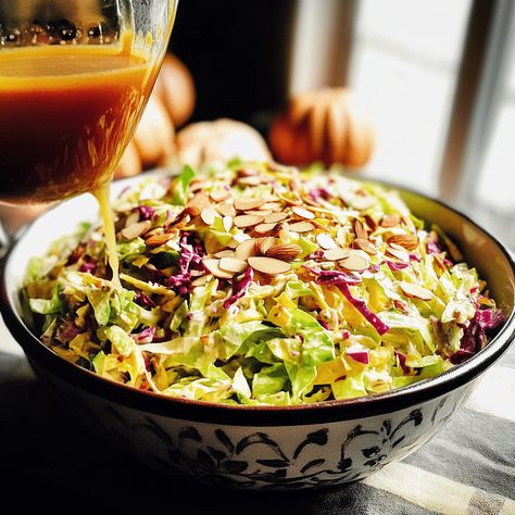 Cranberry Almond Thanksgiving Slaw combines cabbage, dried cranberries, and almonds in a tangy vinaigrette for a festive side dish. Thanksgiving Slaw, Slaw Recipe, Cranberry Almond, Slaw Recipes, Spanish Onion, Green Cabbage, Dried Cranberries, Coleslaw, Gluten Free Vegetarian