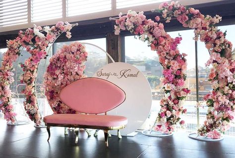 A grand bride and groom wedding stage display using our props and silk floral arches! Styling by @instyleeventsbyneera All props &… Ceremony Backdrop Indoor, Floral Arches, Wedding Hall Decorations, Wedding Reception Backdrop, Wedding Entrance Decor, Wedding Stage Design, Luxury Wedding Decor, Wedding Backdrop Design, Wedding Backdrop Decorations