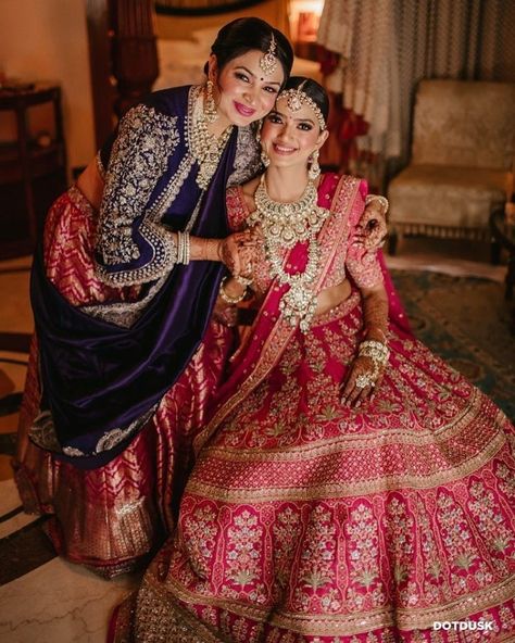 We are crushing over these Bride & Mother Color Coordinating Outfits for Weddings.Coordinating in Pink Lehengas or coordianting in same sarees, this outfits are must seen. #shaadisaga #indianwedding #colorcoordinatingoutfits #brideandmothercolorcoordinatinglehenga #daughterandmothercoordinatedoutfits #daughterandmothercolorcoordinatedoutfits #brideandmotherpictures #brideandmotherpicturesindian #brideandmotherphotos #brideandmotherindian #brideandmotherpicturephotoideas #brideandmotherphotoshoot Colour Coordinated Outfits, Mother Daughter Wedding Photos, Outfits For Wedding, Mother Of The Bride Looks, Mother Daughter Poses, Mother Daughter Wedding, Flushed Cheeks, Coordinated Outfits, Coordinates Outfits