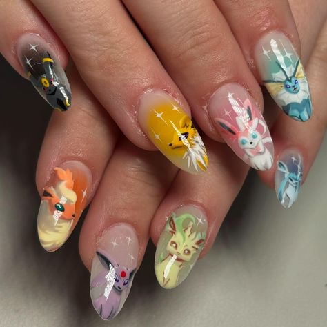 🔥💫🌀💧🖤⚡️🍃 #pokemon #eevee #eeveelution #pokemonnails #nailart #handpainted #characternails #nailartist #gelnails #gelx #apres #auranails #phoenixnails #aznails #nintendo Cute Pokemon Nails, Eevee Nails, Pokemon Nails Designs, Nintendo Nails, Zelda Nails, Pokemon Nail Art, Pokemon Nails, Christmas Pokemon, Pokemon Eevee