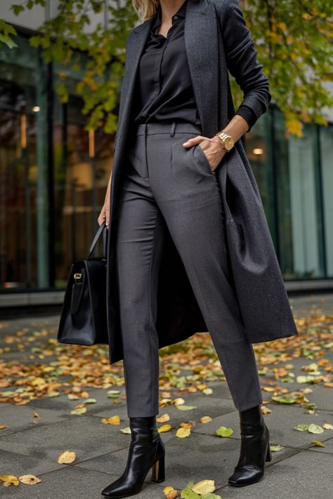 Elevate your office wardrobe with this sleek and sophisticated ensemble! 🍂 The tailored trousers and matching long coat paired with a classic black blouse and stylish ankle boots create the perfect balance of professionalism and chic style. Whether you’re headed to an important meeting or just strolling through the city, this outfit radiates confidence and class. Pin this look to your office style board and get inspired to upgrade your work wardrobe! Trousers Boots Outfit, Ankle Boots Office Outfit, Sleek Office, Business Professional Outfits, Office Wardrobe, Trouser Outfit, Autumn Look, Slacks For Women, Business Chic