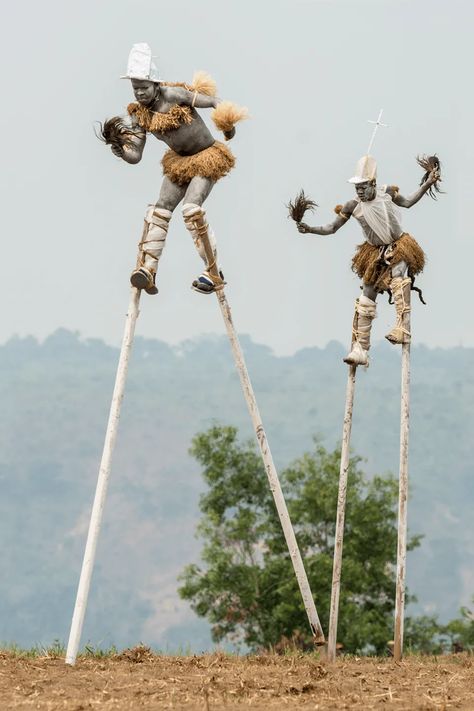 Carol Beckwith and Angela Fisher, Pende "Tall Men Walking" Stilt Dancers, Gungu, DR Congo, 2014 | THK Gallery Africa People, Visit Africa, Bamboo Stick, American Photo, Dr Congo, Tall Men, Stilts, African History, African Culture