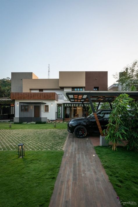 Reclaiming The Lost Glory Of House With Fresh Design Approach | Cognition Design Studio - The Architects Diary Car Porch Design Modern Kerala, Landscape Bungalow, Car Parking Design Home, House With Car Parking, Residence Landscape, Car Porch Design, Wooden Homes, Car Porch, Underground Garage