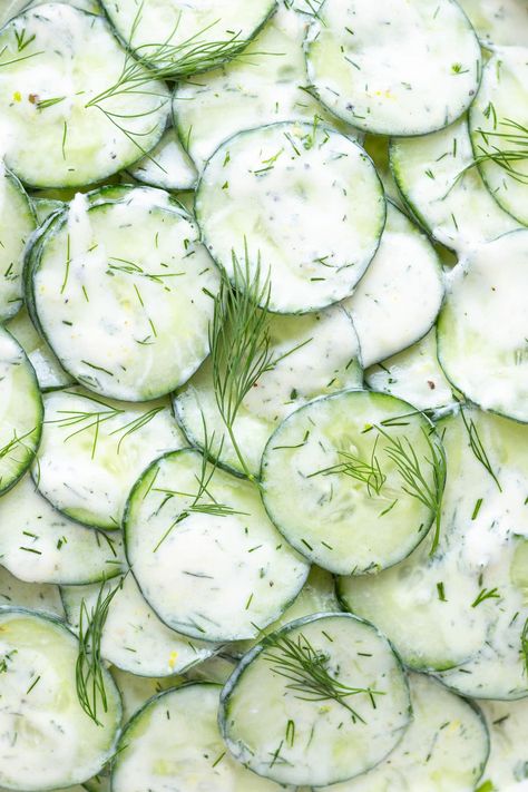 This refreshing Cucumber Yogurt Salad recipe features all the flavors of tzatziki in salad form. So if you love tzatziki, then you will love this creamy cucumber salad with all it's Greek and Mediterranean vibes. It’s loaded with crunchy cucumbers, creamy Greek yogurt, fresh dill, garlic and lemon. A quick and easy side dish that is SO GOOD! | www.mapleandmango.com Salad Benefits, Cucumber Yogurt Salad, Cucumber Snack, German Cucumber Salad, Yogurt Salad, Cucumber Dill Salad, Salad Art, Cucumber Yogurt, Mediterranean Vibes