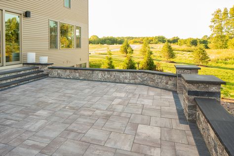 Raised Concrete Patio, Outdoor Hardscape, Decorative Retaining Walls, Stamped Concrete Patio Designs, Retaining Wall Patio, Backyard Gates, Outdoor Improvements, Cambridge Pavingstones, Concrete Retaining Walls