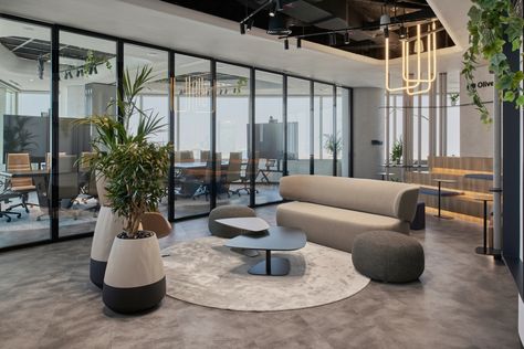 Oliver Wyman Offices - Abu Dhabi | Office Snapshots Office Lounge, Modular Lounges, Exposed Concrete, Open Office, Office Snapshots, Office Environment, Architecture Office, Oak Furniture, Meeting Room