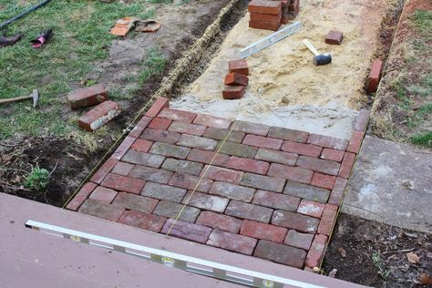 A few months ago, Dave and I had a spontaneous moment and decided to repave our front walkway with antique brick.  It was mid-March and the... Brick Sidewalk, Brick Pathway, Walkway Design, Antique Brick, Brick Path, Outdoor Walkway, Brick Walkway, Concrete Walkway, Front Walkway