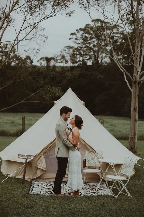 Bride & Groom stand in front of a teepee style glamping tent. Glamping Wedding, Venues For Weddings, Glamping Weddings, 2024 Wedding Trends, Decor For Wedding, Safari Tent, Mountain Decor, Australian Wedding, Luxury Tents