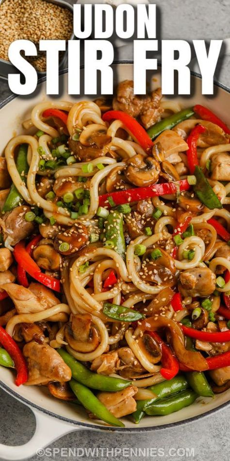 There are so few calories in this easy-to-make udon stir fry recipe. Chewy udon noodles are cooked with juicy chicken thighs, fresh vegetables, and tossed with a thick spicy and sweet sauce. This recipe is so versatile, replace the chicken with some pork, beef, or shrimp. Add any leftover veggies from the fridge to add some color and stretch this dish even further! This dish is perfect for a quick and easy weeknight meal. #udonstirfry #udonnoodlestirfry #udonstirfrysauce #spendwithpennies Pork Udon Noodles Stir Fry, Udon Noodle Stir Fry Chicken, Chicken Udon Noodle Recipe Stir Fry, Udon Stir Fry Recipe, Japanese Soups, Chicken Thigh Stir Fry, Pork Udon, Sweet Spicy Sauce, Chicken Udon