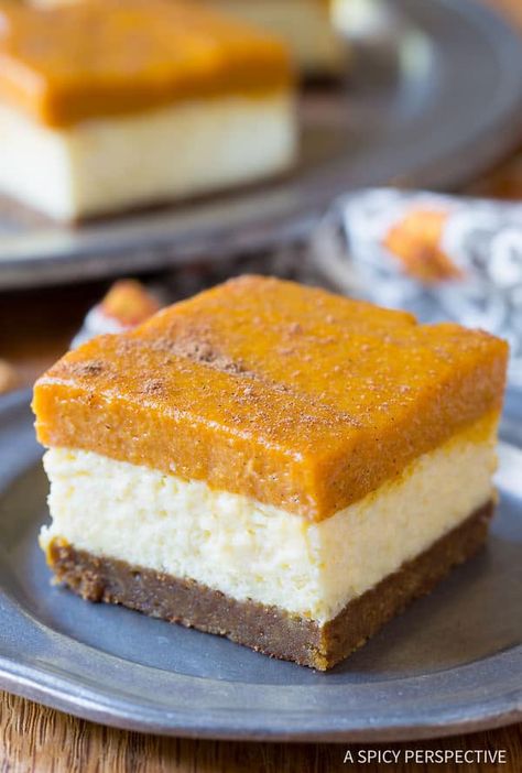 Yummazing Layered Pumpkin Cheesecake Bars on ASpicyPerspective.com Layered Pumpkin Cheesecake, Pumpkin Cheesecake Bars, No Bake Pumpkin Cheesecake, Gingersnap Crust, Pumpkin Pie Cheesecake, A Spicy Perspective, Pie Cheesecake, Pumpkin Bars, Pumpkin Cream