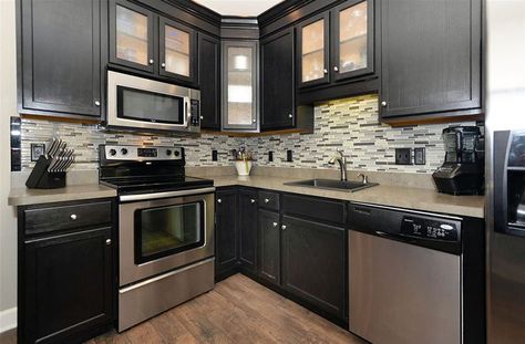 Small contemporary l shaped kitchen with black cabinets #smallkitchen #interiordesign #kitchen Black Kitchen Cabinets Small Kitchen, Kitchens With Dark Cabinets, Kitchen With Black Cabinets, Small L Shaped Kitchens, Kitchen With Dark Cabinets, Cabinets Design Ideas, Beautiful Kitchen Cabinets, Small Kitchen Cabinets, Cabinets Design