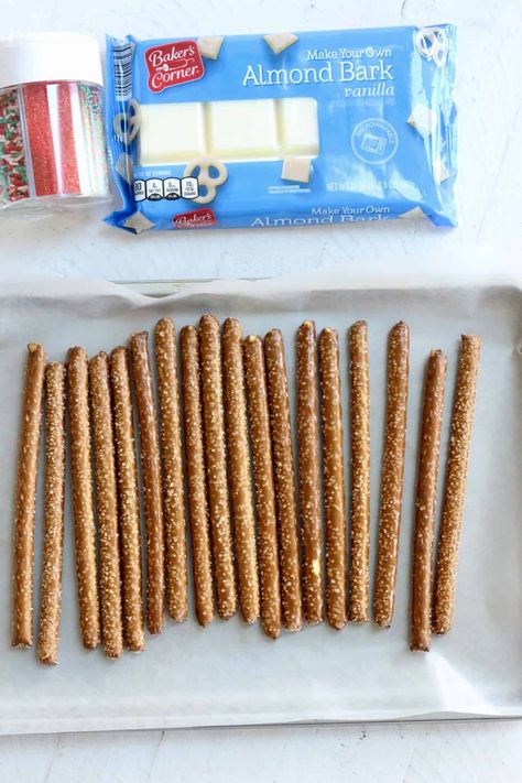 Candy Coated Pretzel Rods, Almond Bark Pretzel Rods, Frosted Pretzel Sticks, Choc Dipped Pretzel Rods, Almond Bark Pretzels Christmas, Candy Coated Pretzels, How To Make Pretzel Rods Dipped, How To Dip Pretzel Rods, Dipped Pretzel Rods How To Make