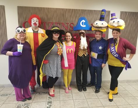 Mayor McCheese, Officer Big Mac, Captain Crook, Birdie, Hamburglar, Ronald McDonald, Grimace - DIY  - Coworkers Mcdonalds Group Costume, Mcdonalds Costume Ideas, Mcdonald's Characters Costumes, Diy Grimace Costume, Grimace Costume Diy, Mcdonald’s Halloween Costumes, Grimace Halloween Costume, Mcdonalds Halloween Costumes, Mcdonalds Costume