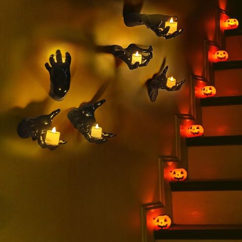 PRICES MAY VARY. Packaging information: You will receive 6 wall mounted horror hands, as well as 6 LED candles and wall mounting screws. You can install these hands on the wall according to your needs, and then glue these candles to the palm position (Glue Not Included). You will receive a set of terrifying Halloween decorative props Terrifying and realistic palms: Each of these palms has clear and visible palm patterns and sharp nails, creating a more realistic image and adding a eerie and terr Scary Halloween Decorations Indoor, Diy Halloween Centerpieces, Halloween Tablescape Ideas, Creepy Hands, Elegant Halloween Party, House Living Room Decor, Living Room Halloween Decor, Archway Decor, Halloween Centerpieces