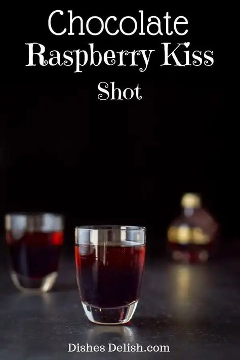 This chocolate raspberry kiss shot only has two ingredients and is so delicious you will have to watch out since it goes down smoothly! #kahlua #chambord #shot #dishesdelish Chambord Shots, Bar Quotes, Kiss Shot, Pudding Shots, Cocktail Shots, Candy Drinks, Liquor Drinks, Boozy Drinks, Shot Recipes