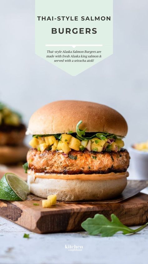 Thai-style Alaska Salmon Burgers. Salmon Fishcakes, Thai Salmon, Thai Fish Cakes, Burger Kitchen, Fish Patties, Salmon Burger Recipe, Thai Fish, Salmon Burger, Sriracha Aioli