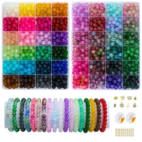 PRICES MAY VARY. 【Great Value Set】Our glass bead kit comes with more than 1440 pieces of crystal glass beads with holes in 48 vivid colors,30 glads beads per color,100pcs gold spacer beads,8pcs charm pendants and 2pcs crystal elastic strings，enough quantity to meet your various needs of jewelry making or DIY craft. 【High Quality Glass Beads for Bracelets】These 8mm round glass bead bracelet kit are made of high-quality glass material ,all glass beads have been finely polished that makes each 8mm Crystal Bracelet Kit, Beads For Bracelets Kit, Glass Beaded Bracelets Diy, Glass Bead Bracelet Ideas, Beading Kits, Bead Types, Beads Kit, Glass Beads Bracelet, Beads For Bracelets