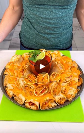 Best Party Appetizer | Best Party Appetizer

Rachel makes a bloomin' quesadilla that's perfect for game day, parties and more!

#viralpost #easyrecipes #food #yum | By Rae in the Life | Taking a stack of flour
tortillas, chop them in half. Y'all ready for this? Next,
you're going to take rotisserie chicken and shred it up in your
food processor or four chicken breast. Then, dump in one can
of Rotel, one block of shredded Colby Jack cheese, half of a
cup to one cup depending on how much sour cream you like right
into your mixing bowl as well as half of a package of taco
seasoning. I like to use the lower sodium seasoning because
the cheese has a ton of salt in it. Just mix everything
together until all of that chicken is fully coated in the
sour cream cheese and rotel mixture. Set this asid Bloomin Chicken Quesadilla, Party Quesadillas, Best Party Appetizers, Colby Jack, Colby Jack Cheese, Pulled Chicken, Party Appetizer, Best Party, Finger Food Appetizers