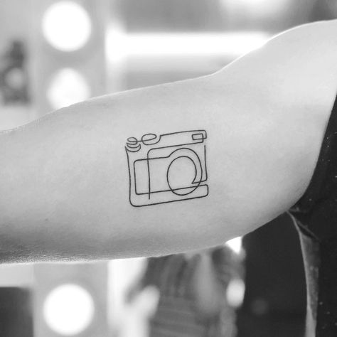 These subtle and small tattoo ideas are perfect for introverts looking to make a quieter statement with their ink. Tattoos For Introverts, Introvert Tattoo, Camera Tattoos, Tattoo Trend, Camera Tattoo, Shape Tattoo, Inspiration Tattoos, Tattoo Photography, Initial Tattoo