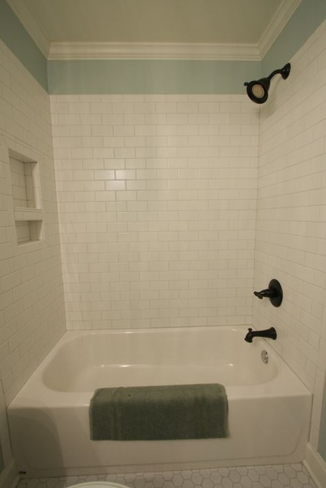 love! note tiles do not go to ceiling, allowing for wall color and nice molding to be showcased Bathroom Planning, White Subway Tile Shower, Tile Tub, Bath Fitter, Tile Showers, Glamorous Bathroom Decor, Tile Tub Surround, Subway Tile Showers, Rental Ideas