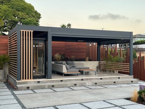 Backyard just got a serious upgrade! Our Weatherproof Pergola with louver lighting sets the perfect vibe, no matter the weather. Day or night, rain or shine. 🌴🌞#bonpergola #pergola #outdoorliving #louverpergola #patiocover Pergola Styling Ideas, Aluminum Pergola Patio Ideas, Pagola Ideas Pergolas, Pagola Ideas Design, Raised Pergola, Pagola Ideas, Shaded Pergola, Modern Pergola Ideas, Contemporary Pergola