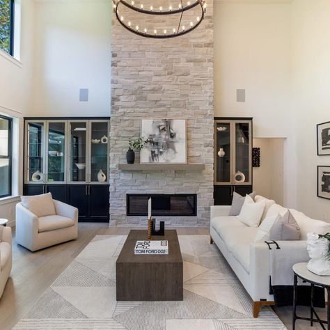 two story fireplace design ideas  - A white-washed stone fireplace Modern Stacked Stone Fireplace, Gray Stone Fireplace Living Room, 2 Story Living Room Fireplace, 2 Story Fireplace Wall, 2 Story Stone Fireplace, 2 Story Fireplace, Brick Fireplace Decor, Black Brick Fireplace, Grey Stone Fireplace