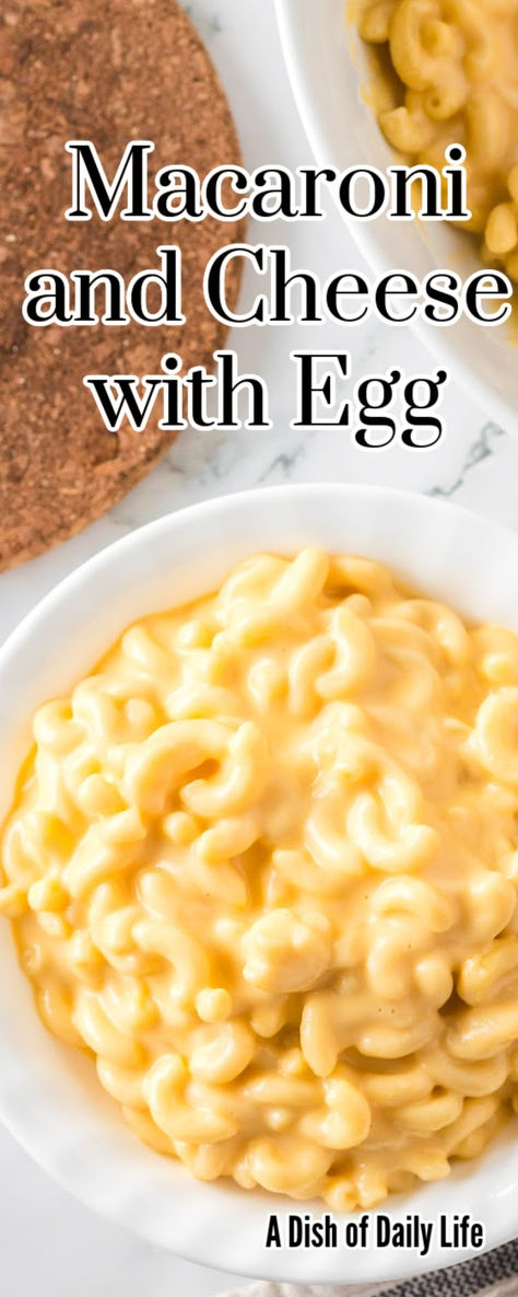 Macaroni and Cheese with Eggs is a delicious twist on the classic comfort food. This mac n cheese recipe takes it to a whole new level, with the addition of eggs that create a velvety texture that is the real deal. #numstheword #macaroniandcheesewitheggs #bakedmacaroniandcheesewithegg #6ingredientmacaroniandcheese #macncheeseforacrowd #macandcheeserecipe #homemademacandcheese #cheesyhomemademacandcheese #homemademacncheese #bakedmacandcheese Homemade Mac And Cheese Recipe With Egg, Mac And Cheese With Egg Noodles, Mac And Cheese Recipe With Eggs, Mac N Cheese With Eggs, Egg Mac And Cheese, Macaroni And Cheese With Eggs, Mac And Cheese With Eggs, Mac And Cheese Recipe With Egg, Mac And Cheese Recipe Evaporated Milk