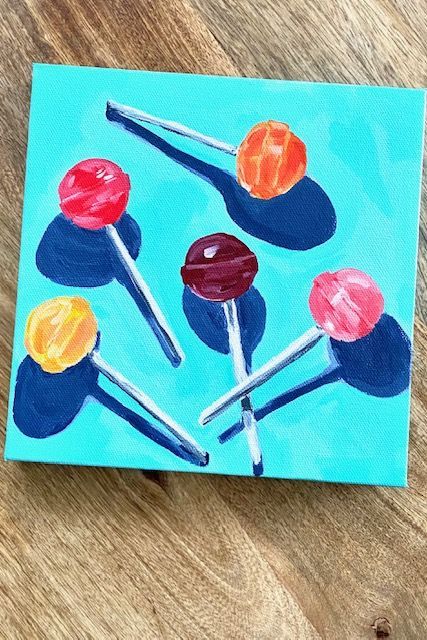 Learn how to paint a lollipop with acrylic paint for beginners! I have a new painting class where I demo how I paint lollipops step by step. Also included in this class are other "sweet treat" painting demos. Food Painting Acrylic Easy, Diy Oil Pastel Art Ideas Easy, Food Painting Easy, Food Canvas Painting, Diy Painting Canvas For Beginners, Lollipop Painting, Candy Painting, Paintings Diy, Design Art Nouveau