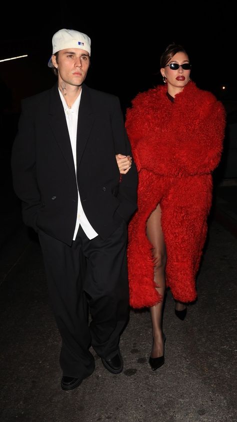 Hailey Bieber Is Singlehandedly Reviving Holiday Glamour in a Cherry-Red Fur Coat Fur Coat Street Style, Red Long Sleeve Mini Dress, Red Fur Coat, Bieber Hailey, Hailey Bieber Style, Holiday Party Fashion, Fuzzy Coat, Red Fur, Chic Coat