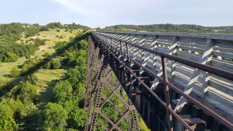 Walk Above The Trees Any Time Of Year At The Trestle Bridge Along The Cowboy Trail In Nebraska Travel Nebraska, Nebraska Sandhills, Trestle Bridge, Bicycle Trail, Railroad Bridge, Union Pacific Railroad, St Valentine, Cycling Adventures, Land Use