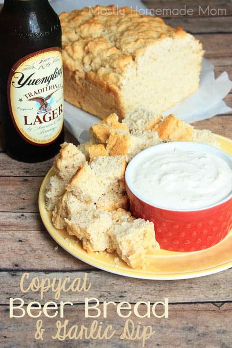 Beer bread cup up next to a garlic dip with a bottle of beer in the background Tastefully Simple Beer Bread, Bread And Dip, Dip For Beer Bread, Bread Dips Recipes, Bread Garlic, Tastefully Simple Recipes, Beer Bread Recipe, Beer Recipe, Garlic Dip