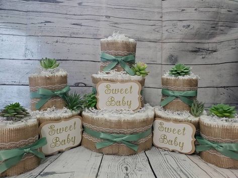 "💖Diaper Cake 5 Piece Set💖 Already assembled Ready for gift giving! The perfect gift for any Baby Shower 🦋5 Diaper Cakes included: 1 - 3 Tier Cake 2 - 2 Tier Cakes 2 - Mini 1 Tier Cakes 🦋Appr. Size for 3 Tier Cake 10\" W x 14\" H. 🦋102 Diapers Included (You Choose the Brand and Size!) 🦋100% Usable Diapers (No Glue or Tape Used) 🦋All Diaper Cakes come fully assembled and wrapped in Tulle 🦋We can personalize a note with baby name and/or message inside! (Keep Scrolling for Details!) 🦋Check Cake For Baby Shower, Baby Shower Neutral, Sage Green Baby Shower, Succulent Theme, Cake For Baby, Mini Diaper Cakes, Diaper Cake Centerpieces, Neutral Shower, Eucalyptus Green