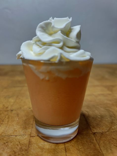 The orange creamsicle shot is a creamy, orange flavored shot that is super easy to make. This sweet shot is great dessert drink. Creamsicle Mimosa, Celebration Desserts, Whipped Cream Vodka, Brandy Cocktails, Orange Vodka, Fruit Cream, Cocktail Shots, Ice Milk, Rum Cocktails